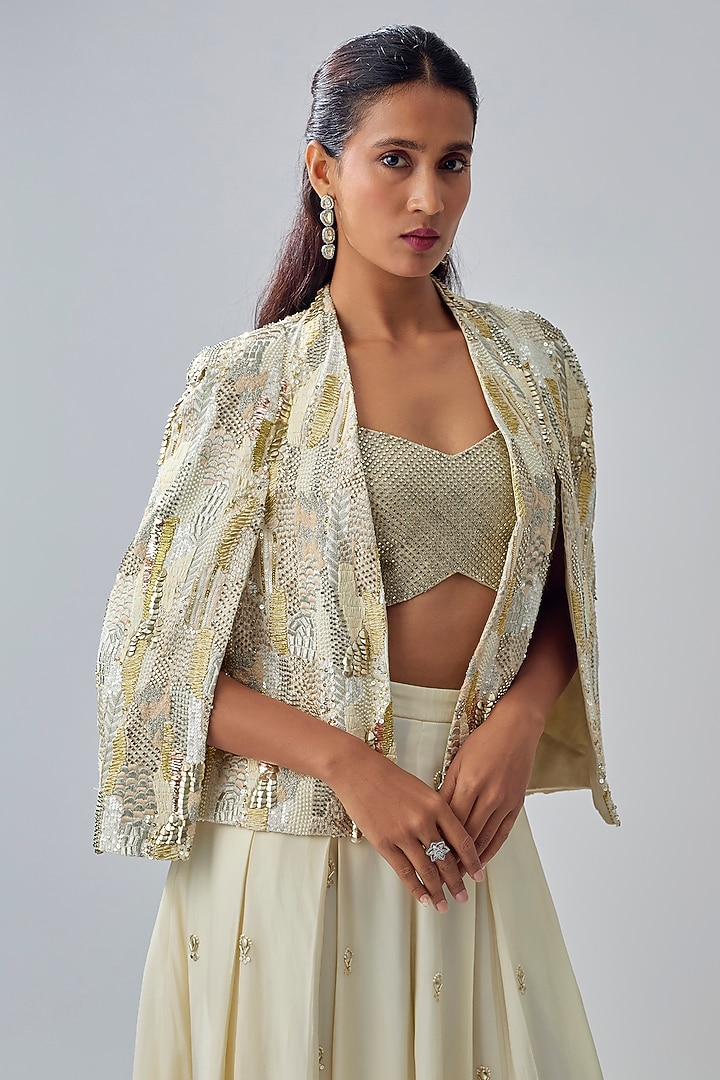 Ivory Crepe Embellished Cape Set by Sva By Sonam & Paras Modi at Pernia's Pop Up Shop