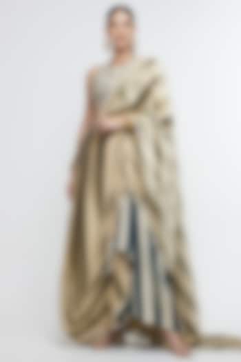 Soft Champagne & Muted Blue Metallic Fabric Striped Embellished Reception Saree Set by SVA BY SONAM & PARAS MODI at Pernia's Pop Up Shop