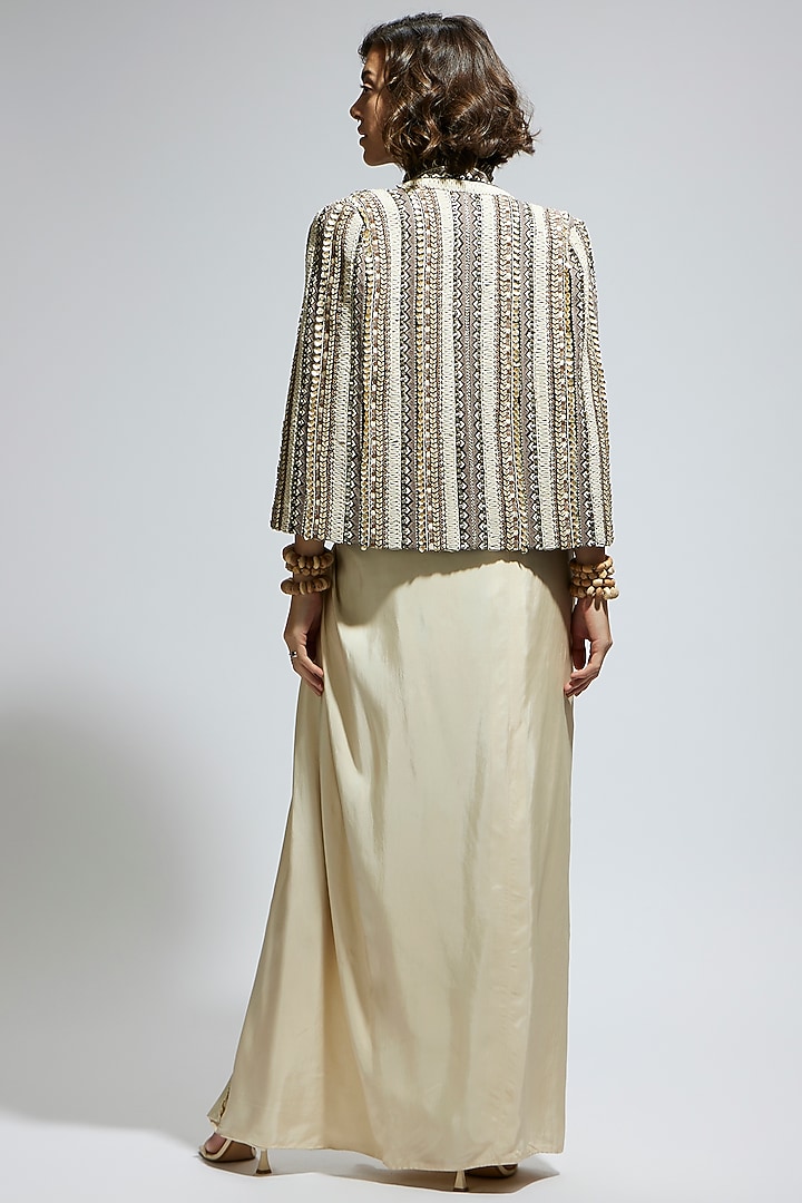 Ivory & Black Silk Embellished Textured Cape Jacket by SVA BY SONAM & PARAS MODI at Pernia's Pop Up Shop