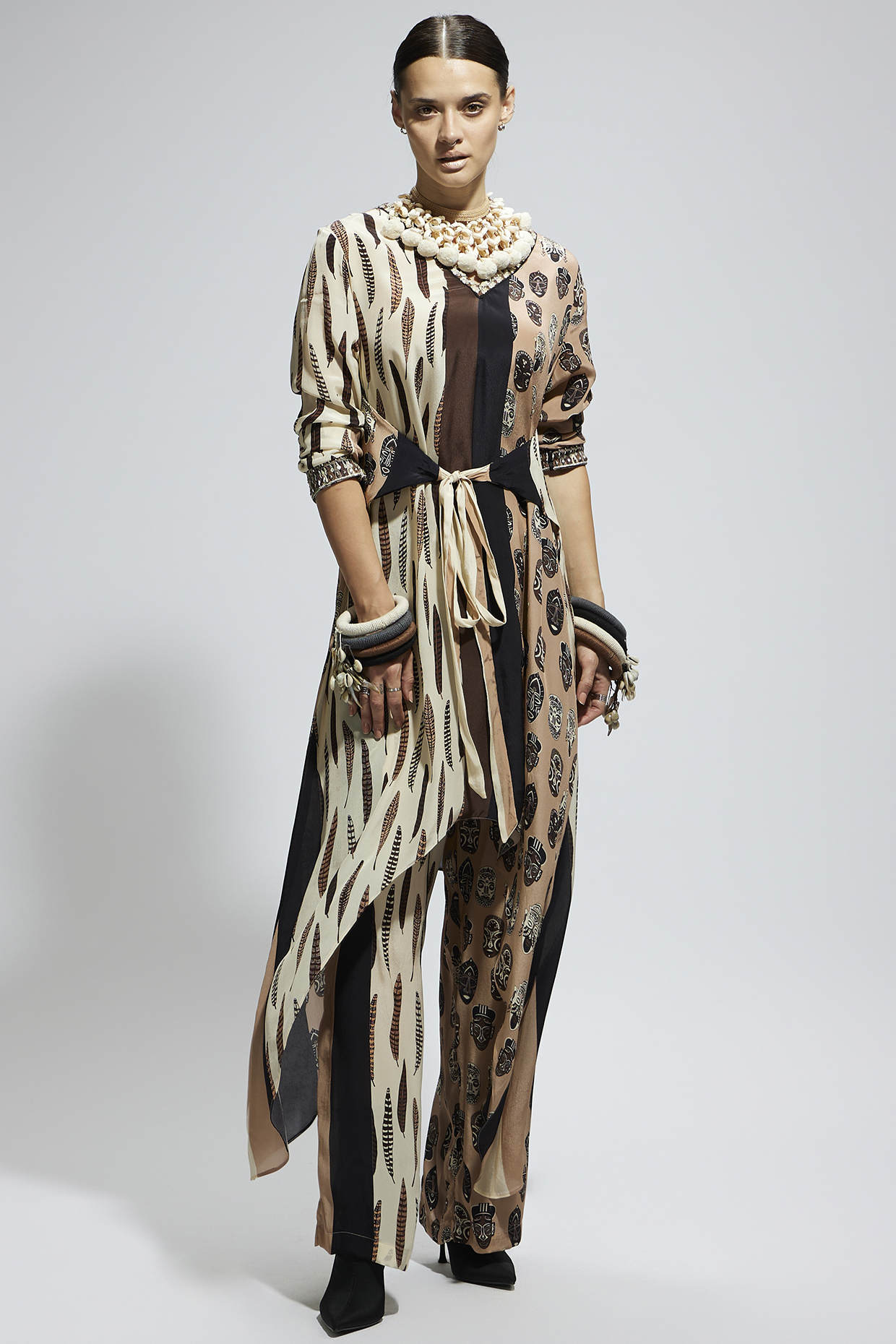 Ivory Crepe Feather Printed Tunic Set by SVA BY SONAM & PARAS MODI at Pernia's Pop Up Shop