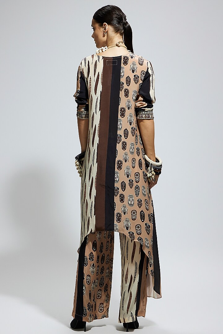Ivory Crepe Feather Printed Tunic Set by SVA BY SONAM & PARAS MODI at Pernia's Pop Up Shop