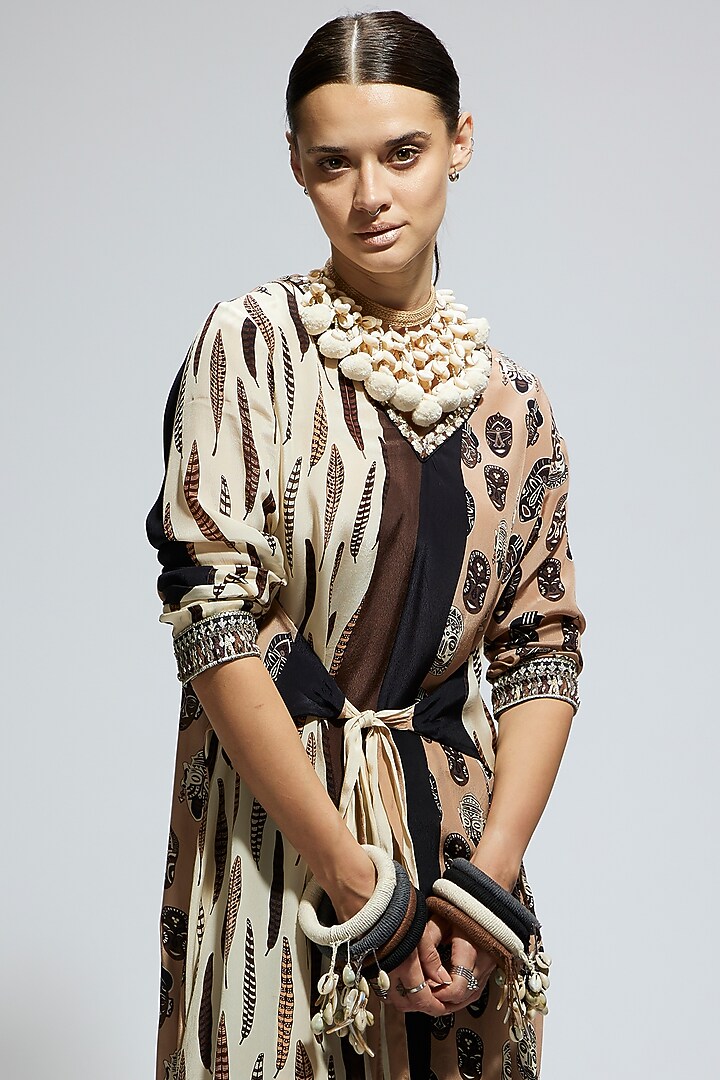 Ivory Crepe Feather Printed Tunic Set by SVA BY SONAM & PARAS MODI at Pernia's Pop Up Shop