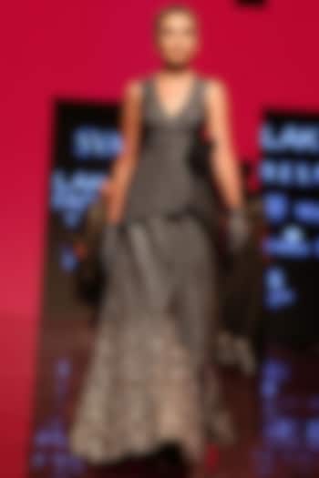 Black Peplum Jacket With Embroidered Bridal Lehenga Skirt by SVA BY SONAM & PARAS MODI at Pernia's Pop Up Shop