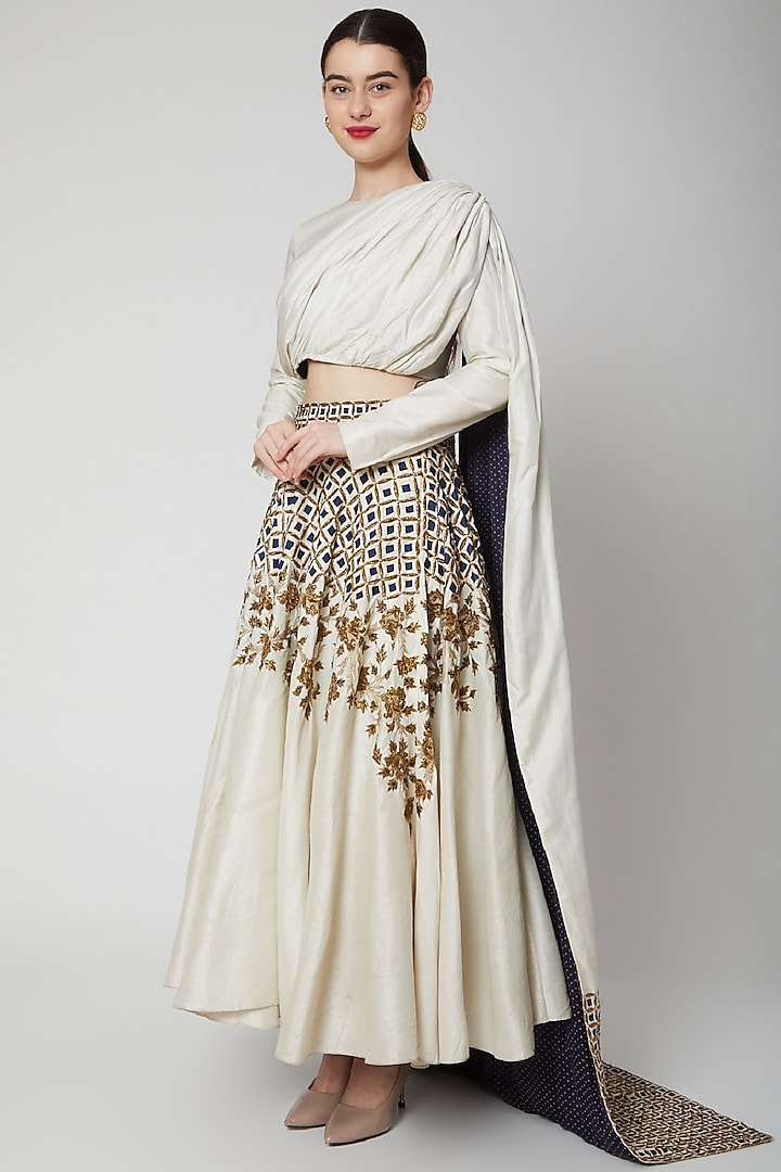 Off White Embroidered Draped Bridal Lehenga Set by SVA BY SONAM & PARAS MODI at Pernia's Pop Up Shop