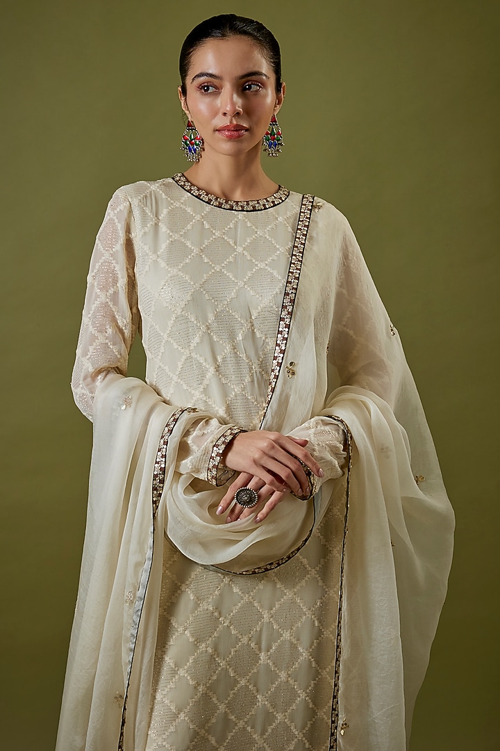 Ivory Silk Kurta Set by Sva By Sonam & Paras Modi at Pernia's Pop Up Shop
