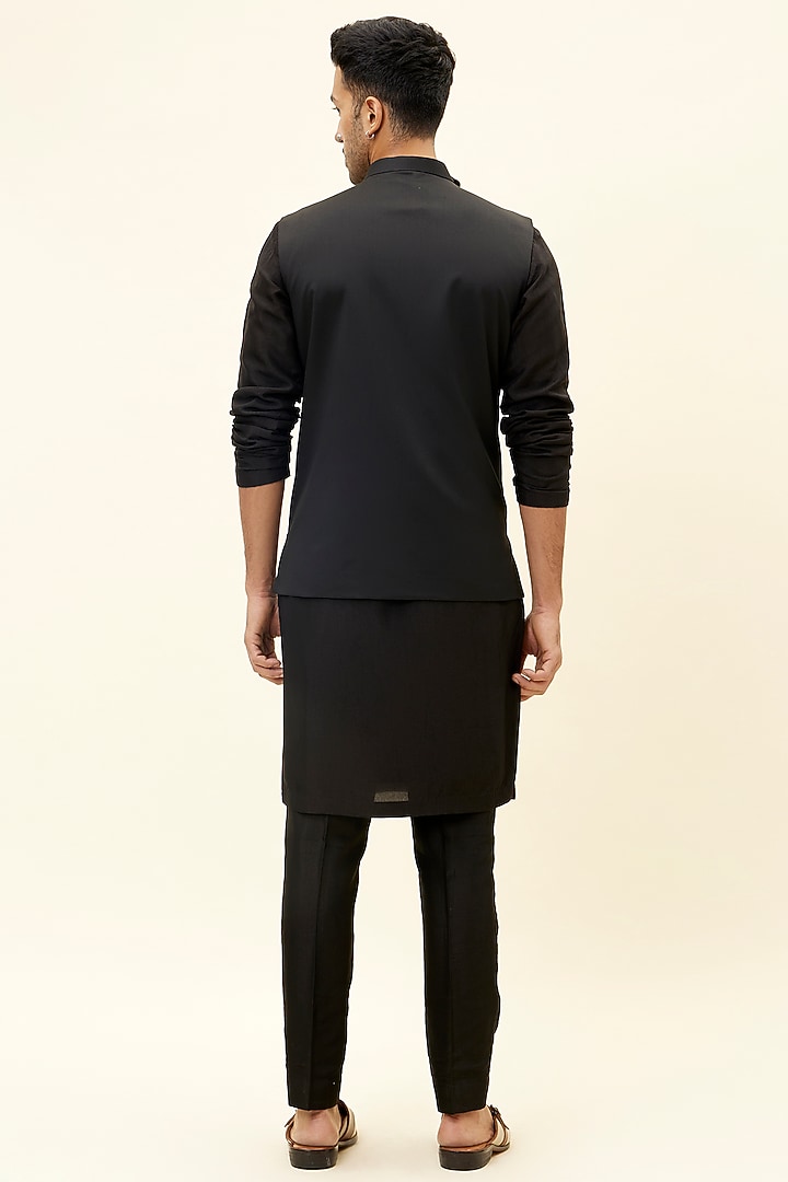 Black Suiting Overlap Bundi Jacket by SVA BY SONAM & PARAS MODI Men at Pernia's Pop Up Shop