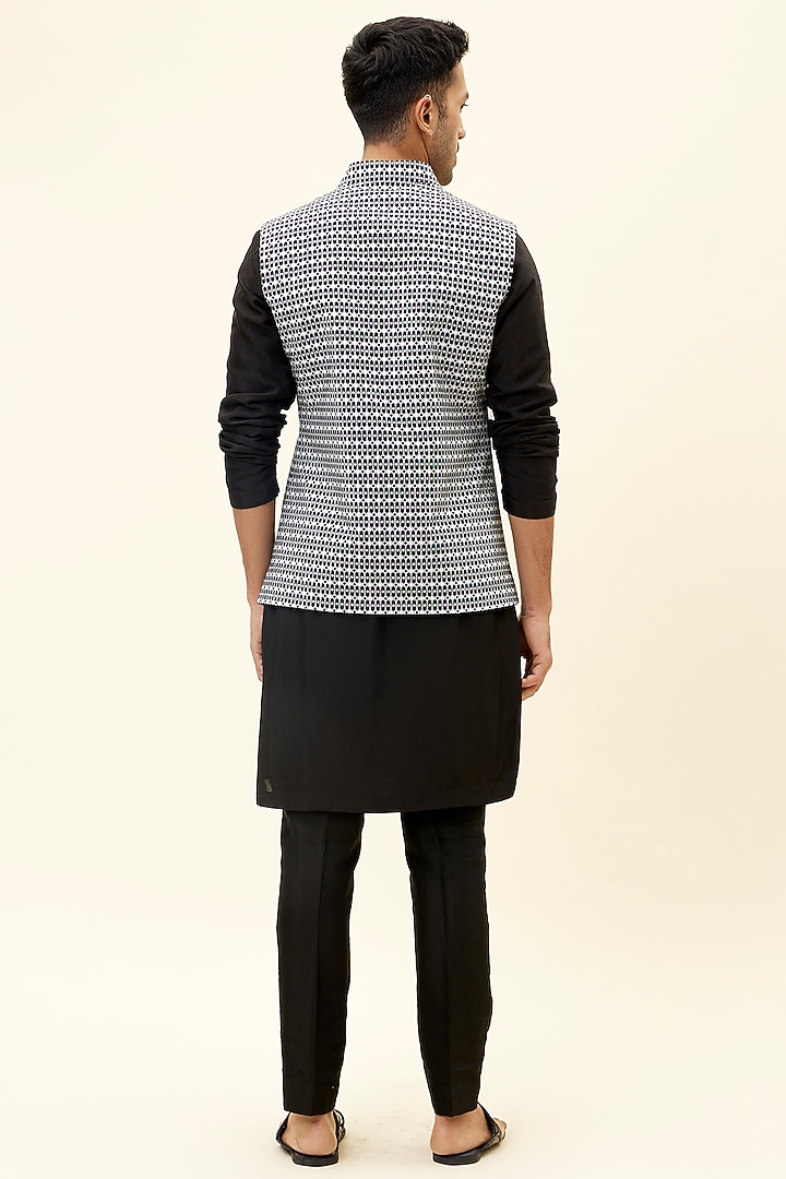 Black Raw Silk Printed Bundi Jacket by SVA BY SONAM & PARAS MODI Men at Pernia's Pop Up Shop