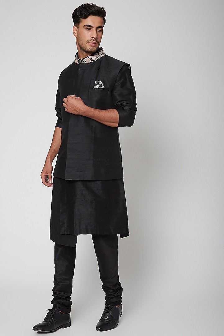 Black Raw Silk Thread Embroidered Bundi Jacket by SVA BY SONAM & PARAS MODI Men at Pernia's Pop Up Shop
