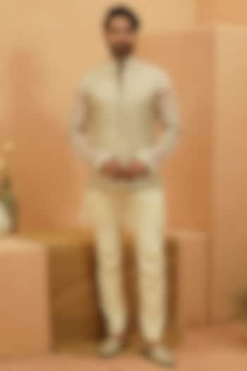 Ivory Raw Silk Chevron Embroidered Bundi Jacket Set by Sva By Sonam & Paras Modi Men