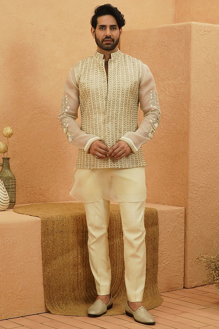 Ivory Raw Silk Chevron Embroidered Bundi Jacket Set by Sva By Sonam & Paras Modi Men