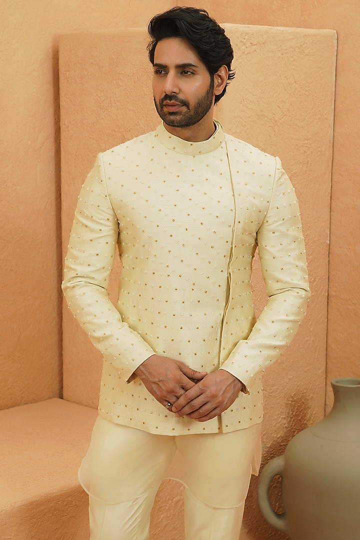 Ivory Silk Gold Embellished Asymmetric Jacket by Sva By Sonam & Paras Modi Men