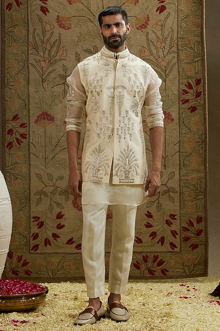 Ivory Silk & Organza Embellished Bundi Jacket by SVA BY SONAM & PARAS MODI Men at Pernia's Pop Up Shop