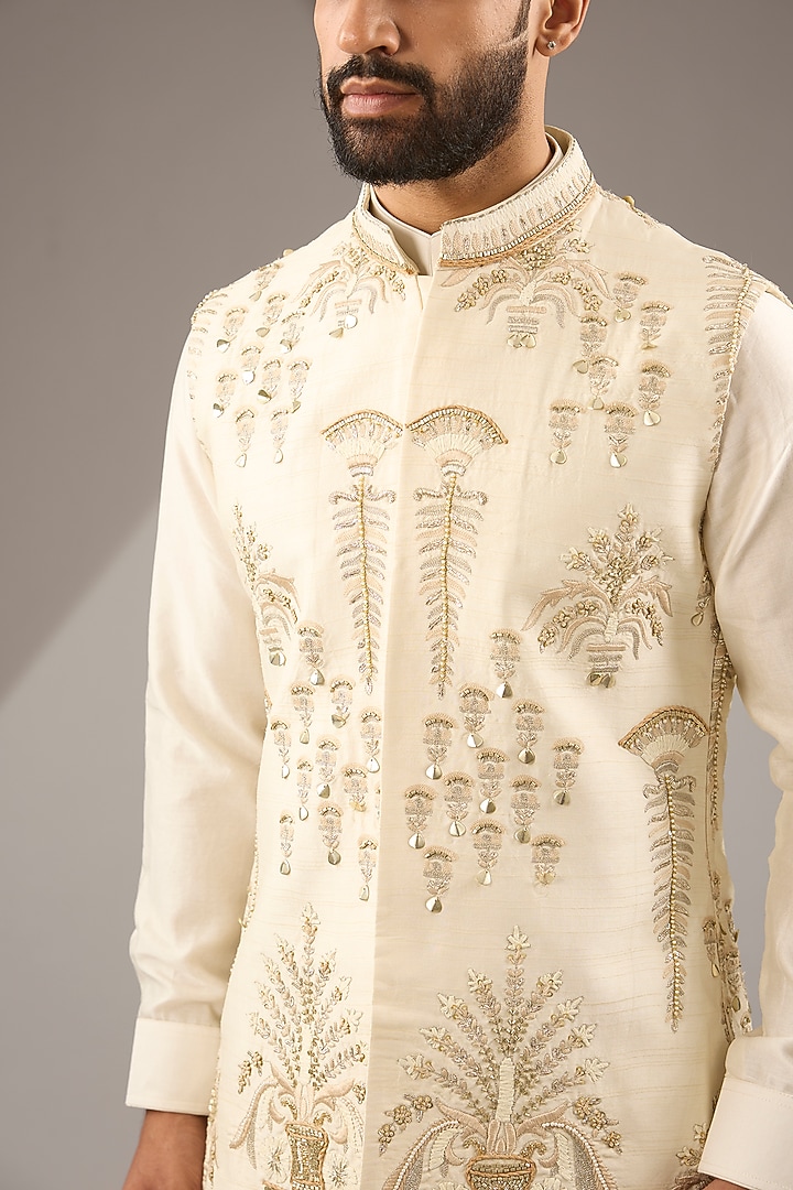 Ivory Silk & Organza Embellished Bundi Jacket by Sva By Sonam & Paras Modi Men at Pernia's Pop Up Shop