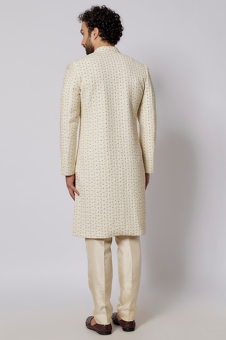 Ivory Silk Metal Embellished Groom Sherwani Set by SVA BY SONAM & PARAS MODI Men at Pernia's Pop Up Shop
