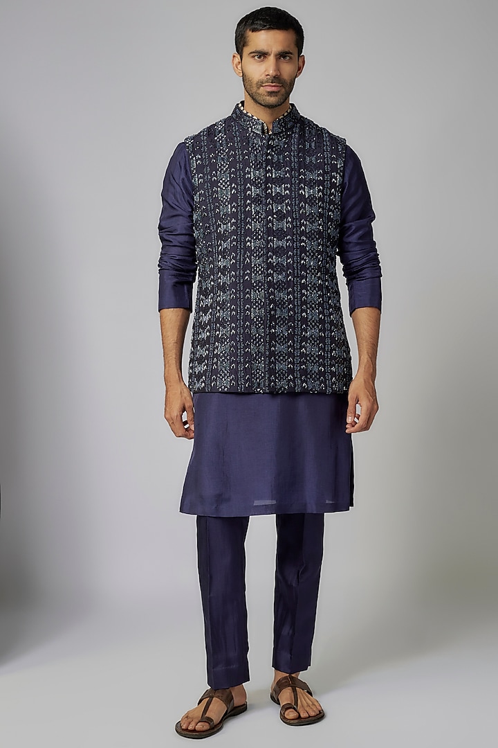 Navy Blue Raw Silk Embellished Bundi Jacket Set by Sva By Sonam & Paras Modi Men