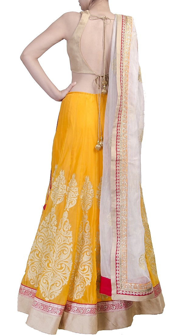 Mango yellow lehenga choli with zari work available only at Pernia's Pop-up shop.