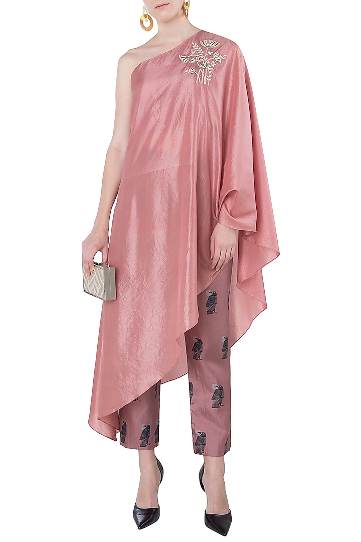 Rose pink embroidered one shoulder cape with cigarette pants available only at Pernia's Pop Up Shop.