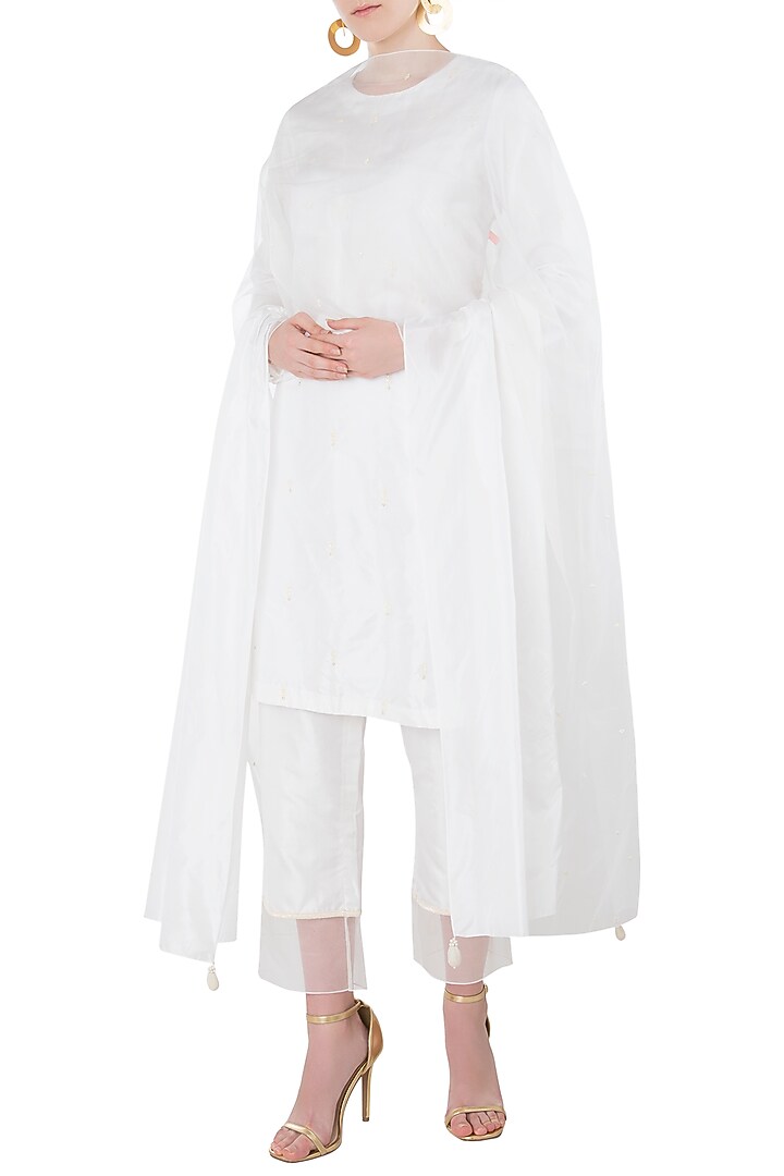 White embroidered short anarkali with cigarette pants set available only at Pernia's Pop Up Shop.