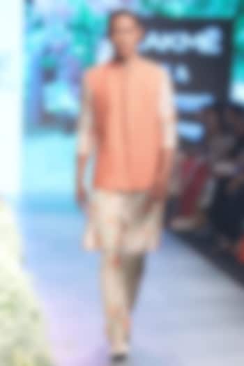 Beige and orange dahlia print kurta with pleated pants available only at Pernia's Pop Up Shop.