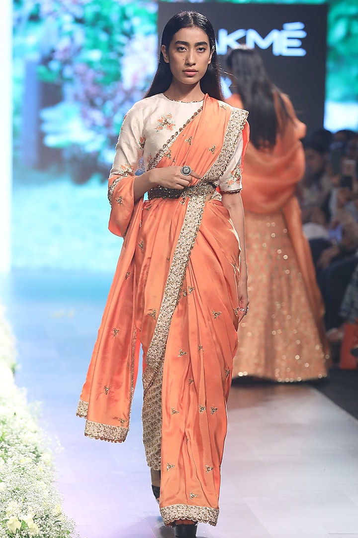 Orange Embroidered Saree with Beige Dahlia Print Blouse, Pants and Belt by SVA BY SONAM & PARAS MODI