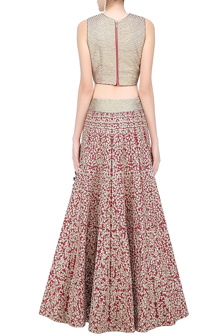 Maroon and gold aari and pita work lehenga set available only at Pernia's Pop Up Shop.