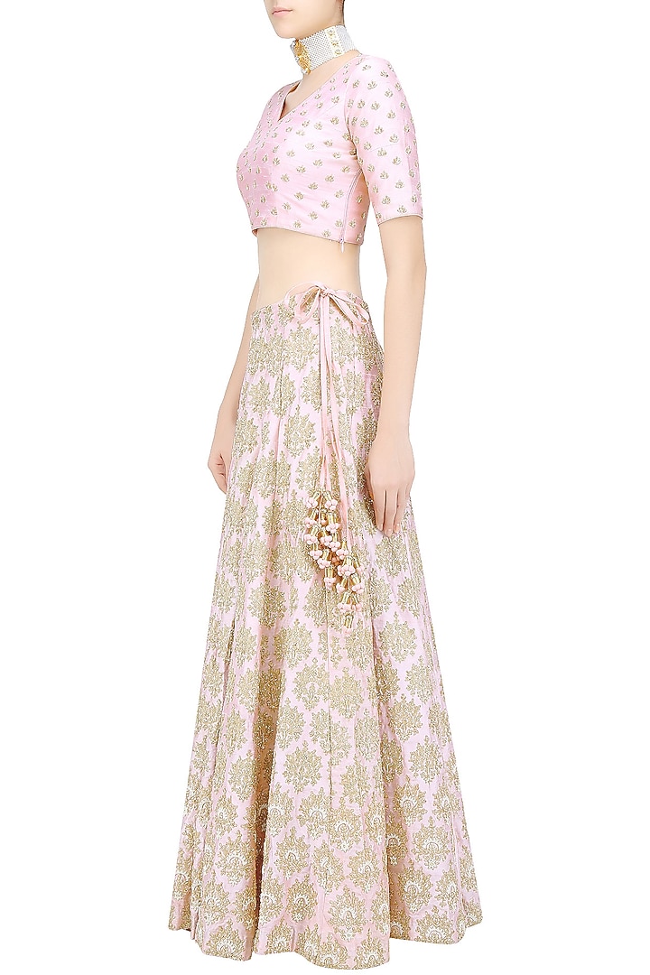 Baby pink and gold floral embroidered lehenga set available only at Pernia's Pop Up Shop.