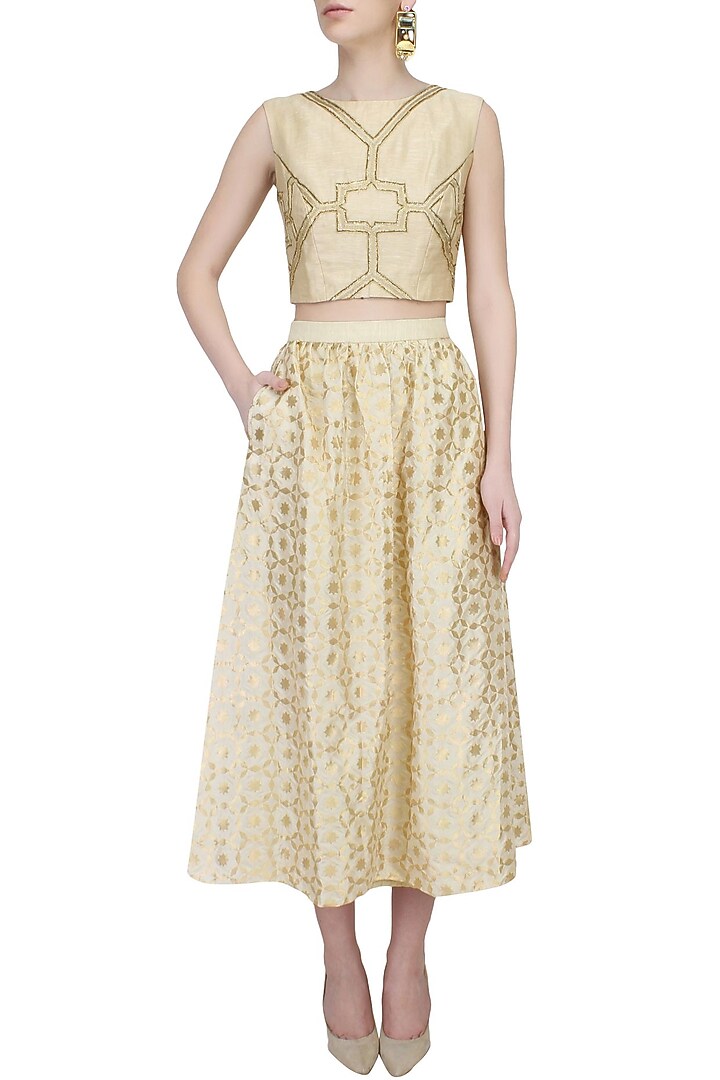 Beige geometrical brocade side pockets skirt available only at Pernia's Pop Up Shop.