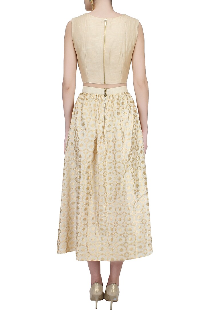 Beige geometrical brocade side pockets skirt available only at Pernia's Pop Up Shop.