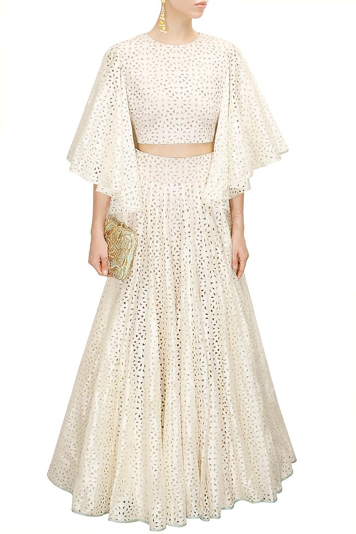 Off white cutwork peated lehenga