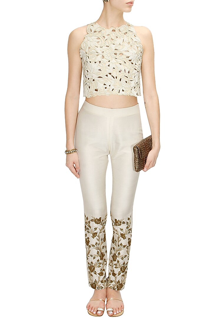 Off white floral embroidered cigarette pants available only at Pernia's Pop-Up Shop.