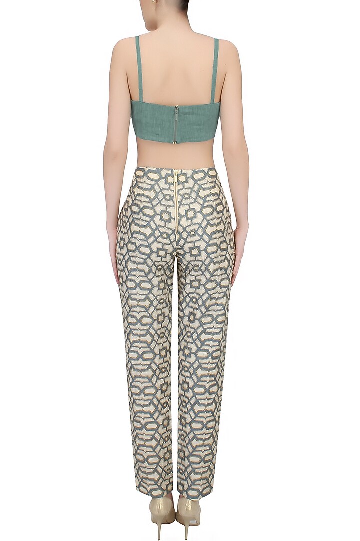 Teal printed hand embroidered pants available only at Pernia's Pop Up Shop.