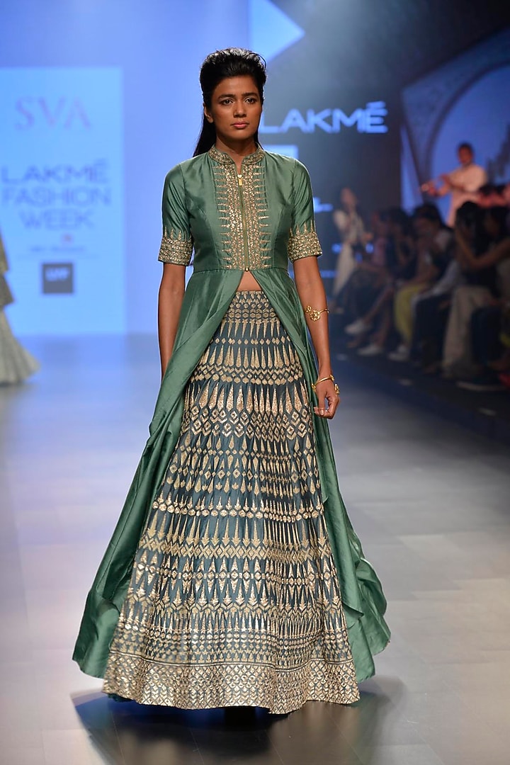 Olive green embroidered asymmetrical jacket available only at Pernia's Pop Up Shop.