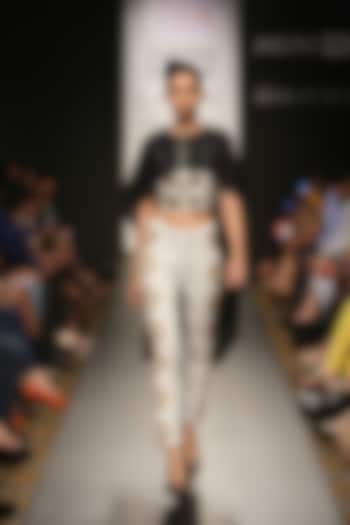 Black and white embroidered high waist pants available only at Pernia's Pop-Up Shop.
