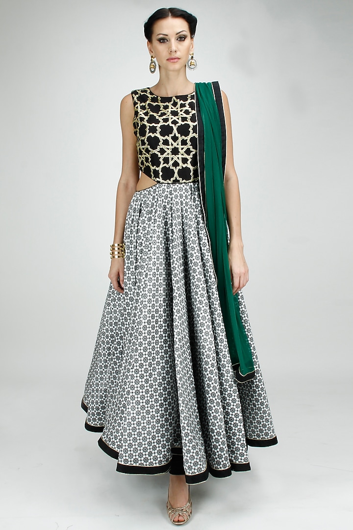 Black and white embroidered cut out anarkali with green dupatta available only at Pernia's Pop-Up Shop.