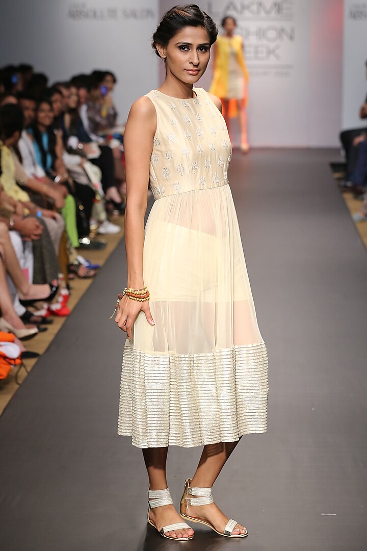 Beige trishul embroidered sheer dress with shorts by SVA BY SONAM & PARAS MODI
