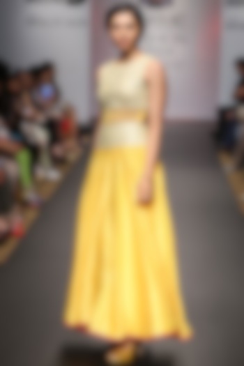 Yellow floor length dress with sheer midriff by SVA BY SONAM & PARAS MODI