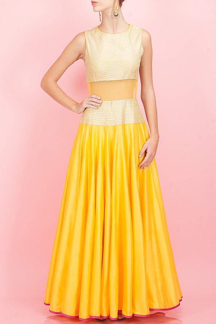 Yellow floor length dress with sheer midriff available only at Pernia's Pop-Up Shop.