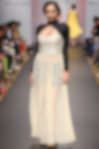 Beige sheer dress with black shorts and cross over top available only at Pernia's Pop-Up Shop