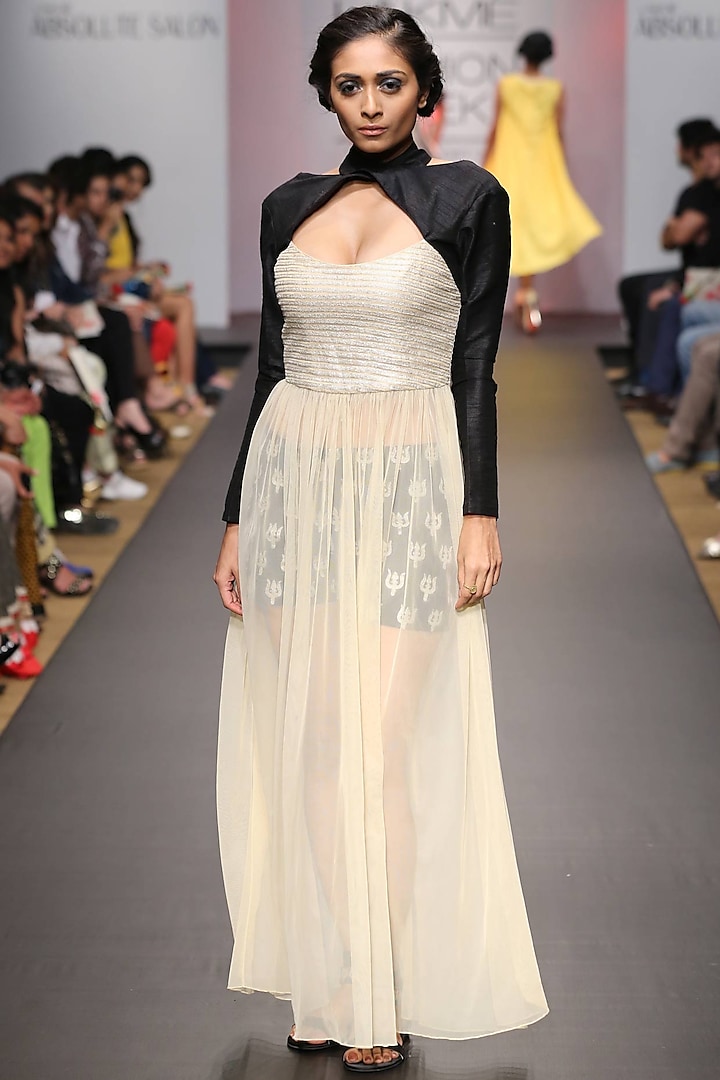 Beige sheer dress with black shorts and cross over top by SVA BY SONAM & PARAS MODI