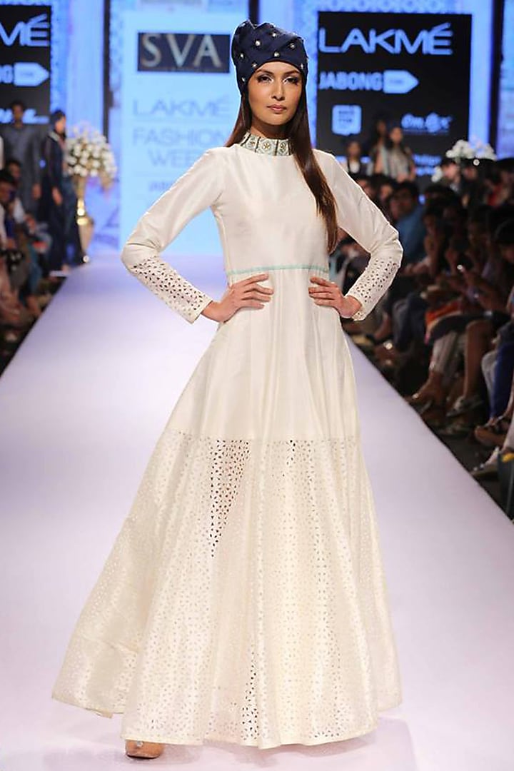 White dye cutwork floor length anarkali available only at Pernia's Pop-Up Shop.