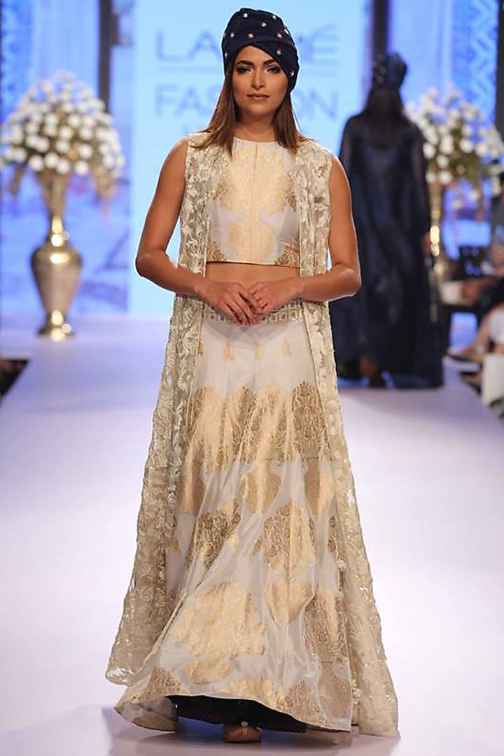 White embroidered sheer jacket lehenga set available only at Pernia's Pop-Up Shop.