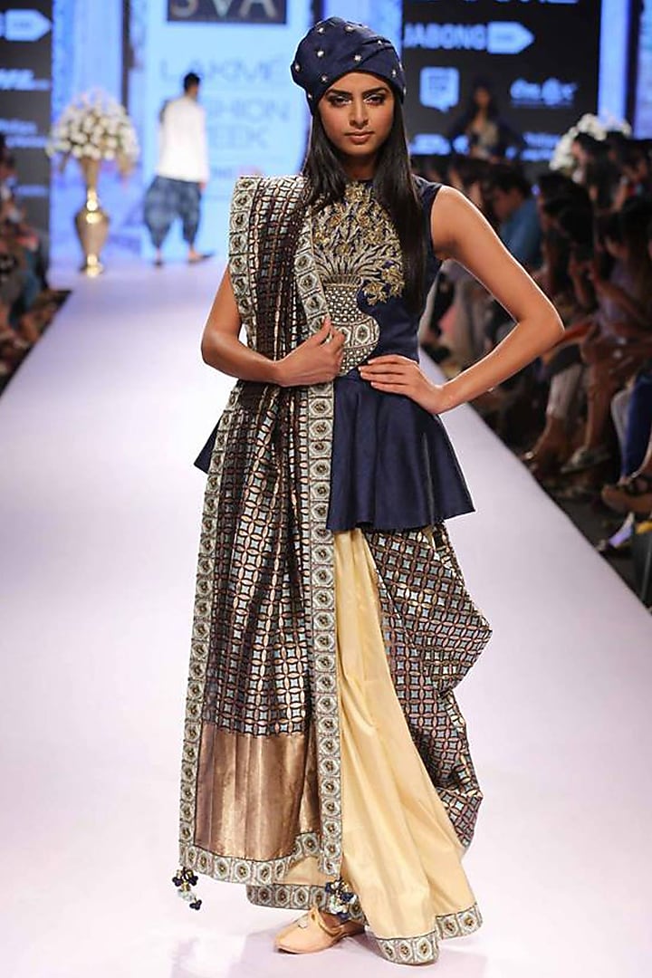 Mid-night blue flower pot embellished peplum top available only at Pernia's Pop-Up Shop.