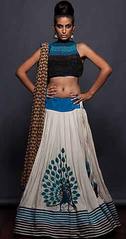 Off white and blue lehenga set by SVA BY SONAM & PARAS MODI