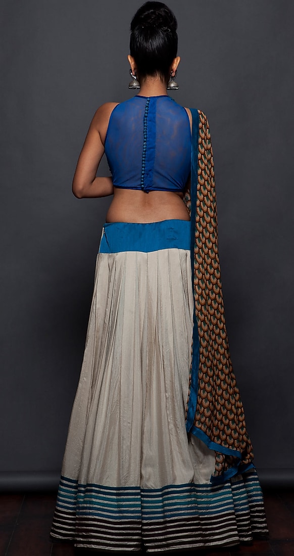 Off white resham work peacock ghaghra set available only at Pernias pop-up shop.