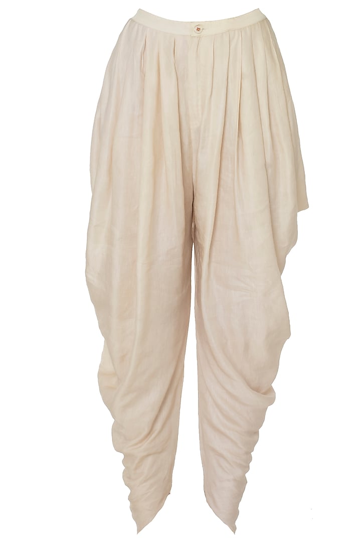 Red asymmetrical printed kurta with off white dhoti pants available only at Pernia's Pop Up Shop.