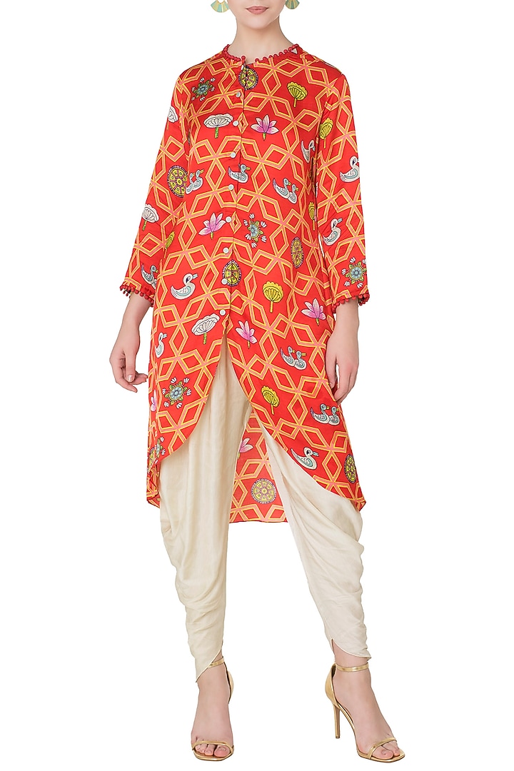 Red asymmetrical printed kurta with off white dhoti pants available only at Pernia's Pop Up Shop.