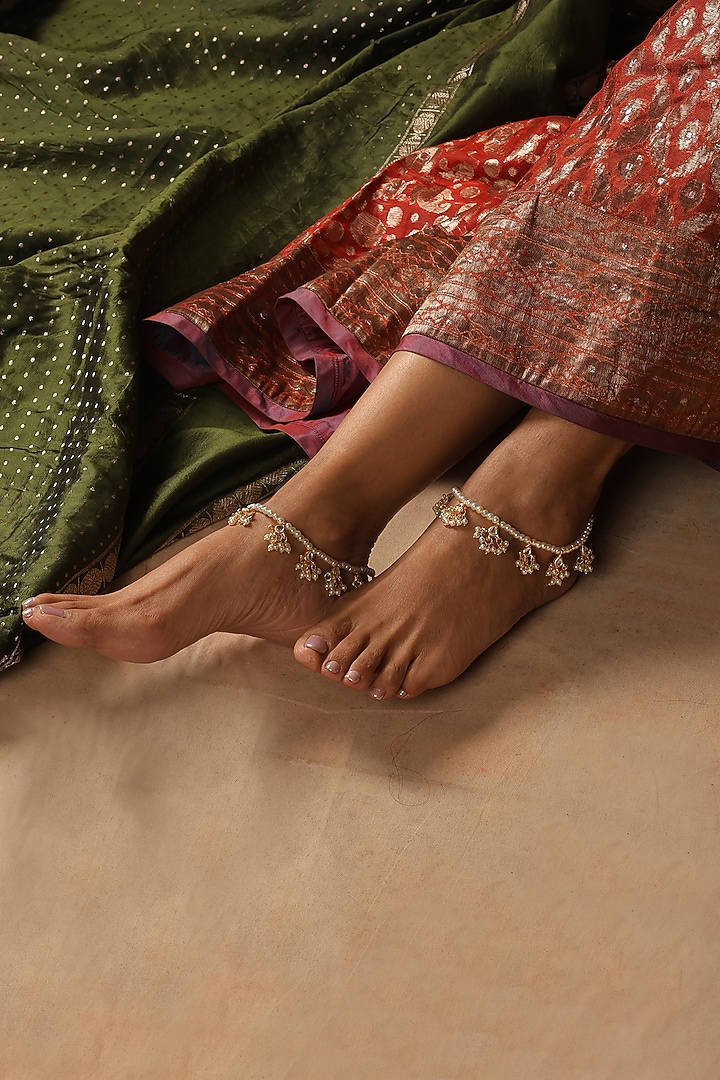 Gold Finish Kundan Polki & Pearl Anklets (Set Of 2) by Swabhimann Jewellery at Pernia's Pop Up Shop