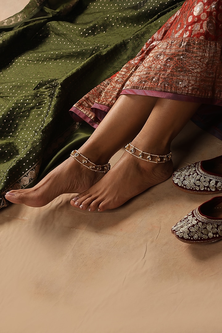 Gold Finish Kundan Polki & Pearl Anklets (Set Of 2) by Swabhimann Jewellery at Pernia's Pop Up Shop