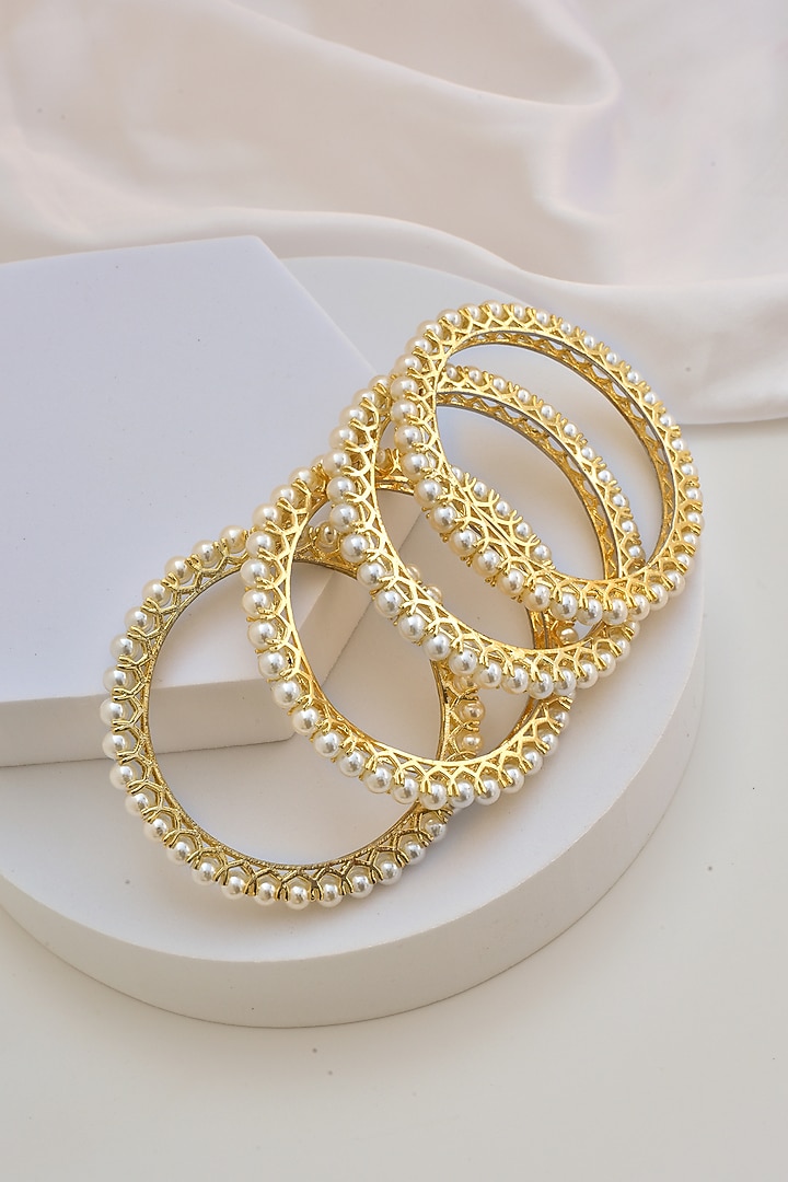 Gold Finish Kundan Polki Bangles (Set of 4) by Swabhimann Jewellery at Pernia's Pop Up Shop