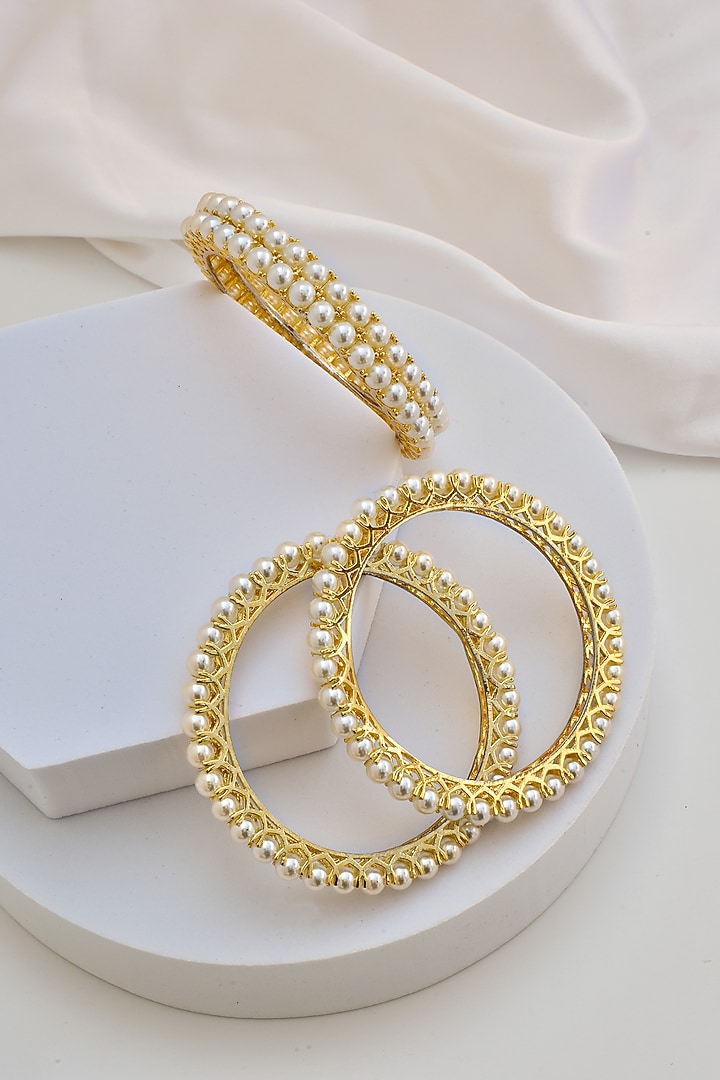 Gold Finish Kundan Polki Bangles (Set of 4) by Swabhimann Jewellery at Pernia's Pop Up Shop